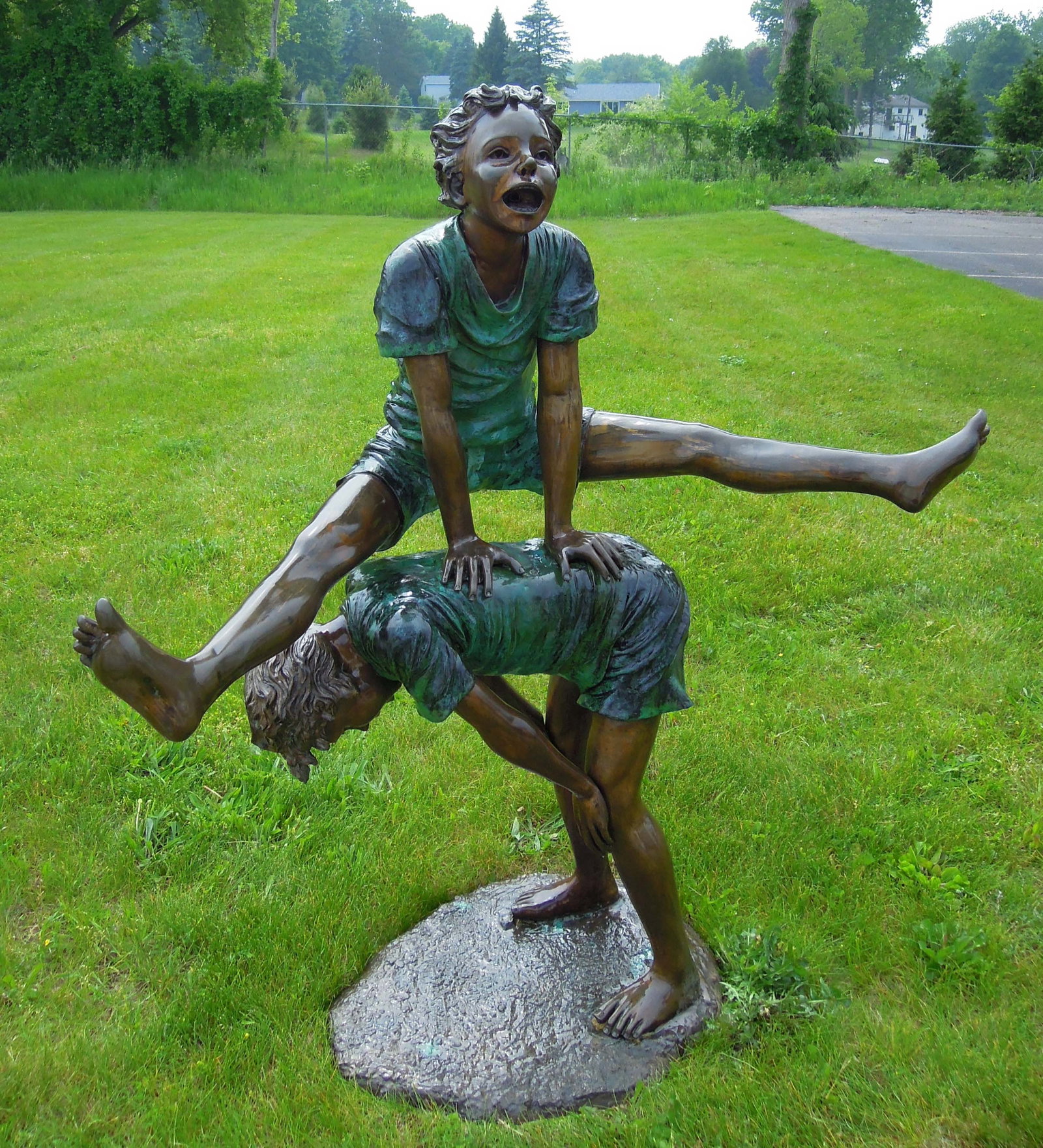 LIFE SIZE VINTAGE BRONZE SCULPTURE "LEAP FROG" KIDS: Very fine detail. Very heavy. Signed. 64" high, 53" wide, 22" deep.