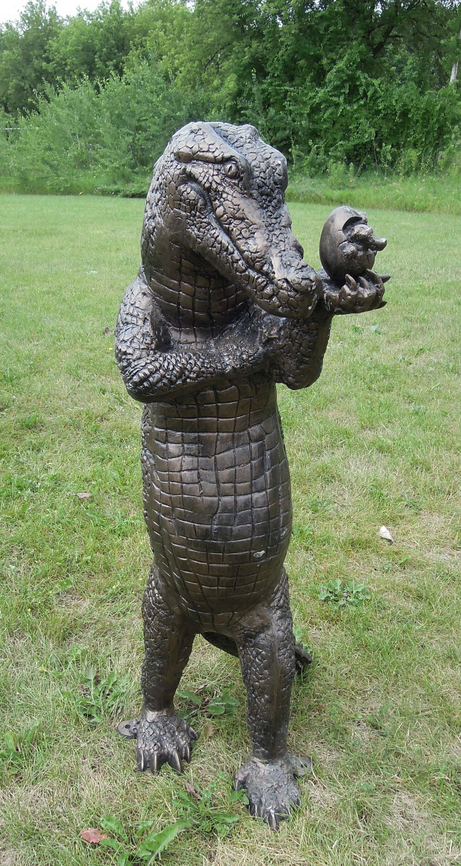 LARGE BRONZED ALUMINUM SCULPTURE OF STANDING ALLIGATOR WITH HATCHING EGG: Very fine detail. 53" high, 18" wide, 38" deep.