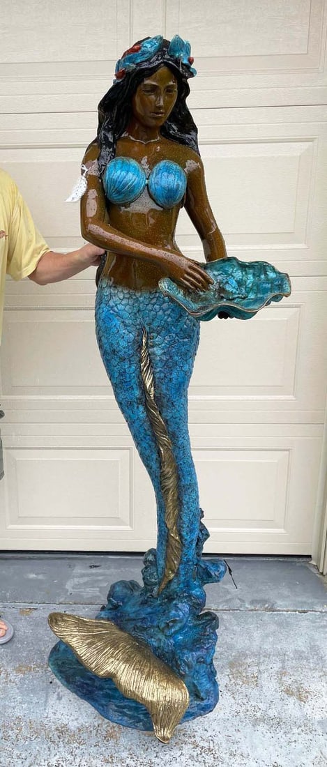 BEAUTIFUL LIFE SIZE BRONZE SCULPTURE/FOUNTAIN OF MERMAID: Standing mermaid on tail holds shell in hands. Excellent detail. Three color patina. Note: Water emerges from shell when used as a fountain. 68 1/2" high, 20" wide, 21" deep.