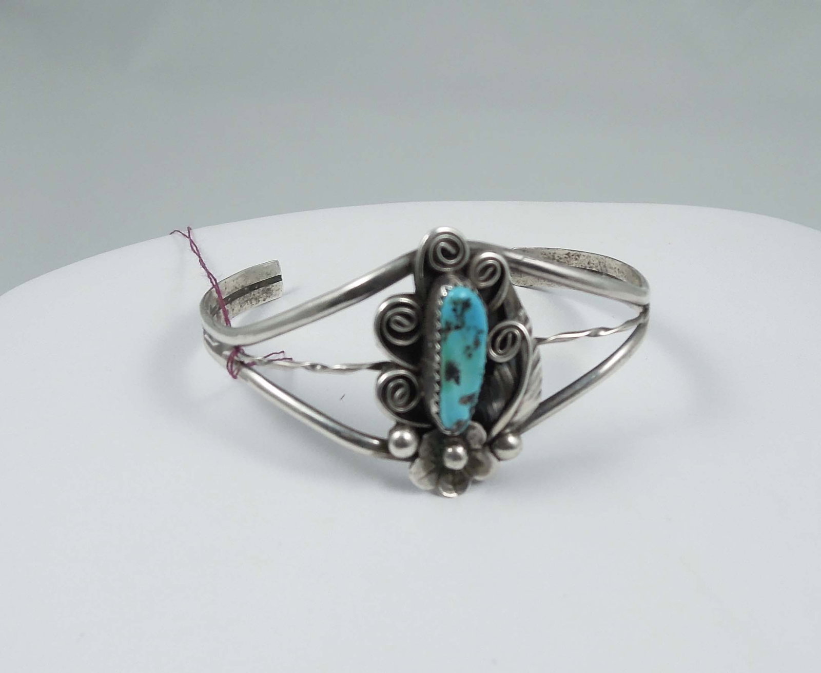 VINTAGE NATIVE AMERICAN STERLING SILVER & TURQUOISE CUFF BRACELET: Bracelet made by Navajo artist Jameson Lee and signed inside. Very good condition.