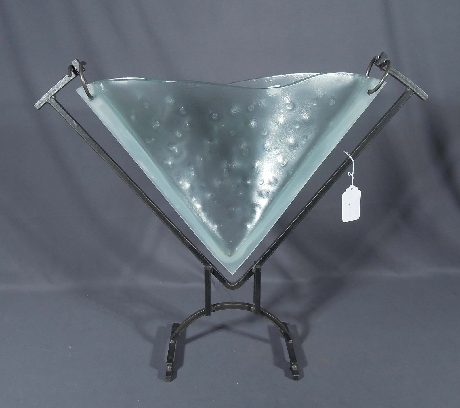 HEAVY METAL AND GLASS HANGING VASE: 23 1/2" high, 27" wide, 8" deep.