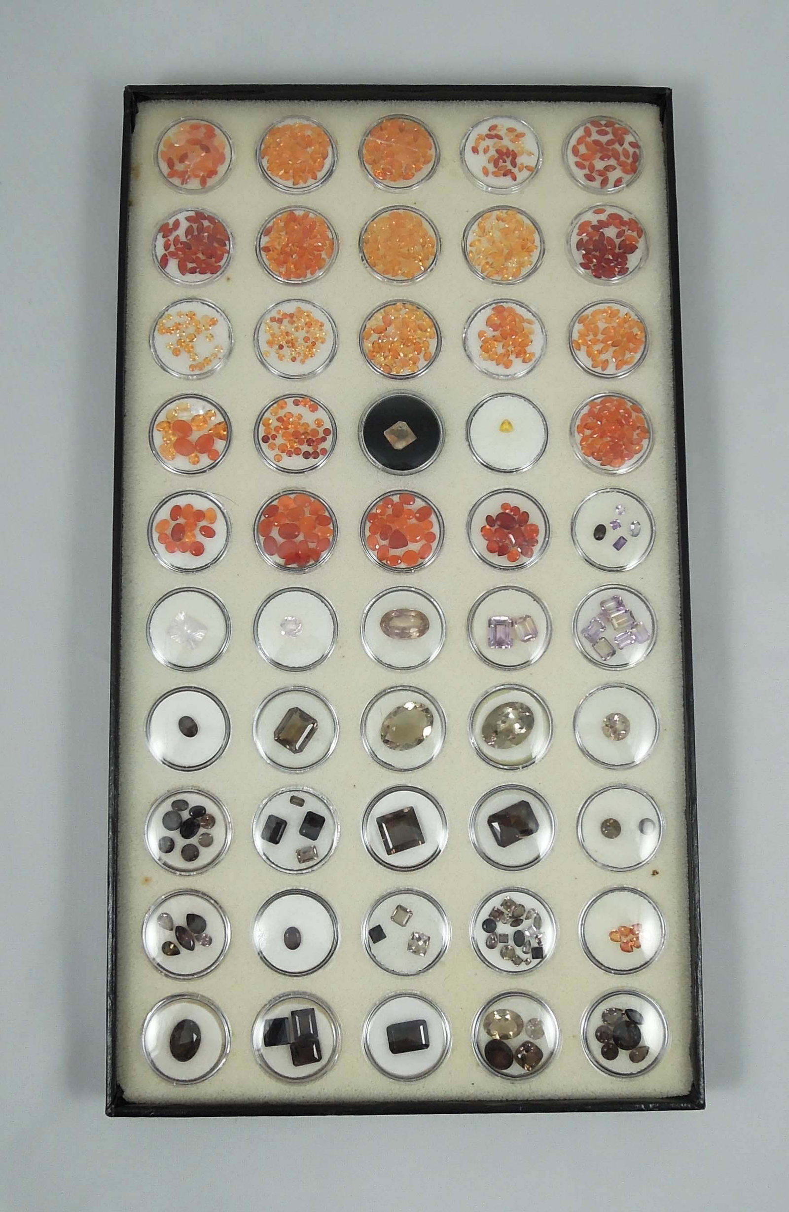CASED BOX OF 100'S CTS. OF GEMSTONES: Including fire opals, citrine, ametrine, smokey quartz and more.