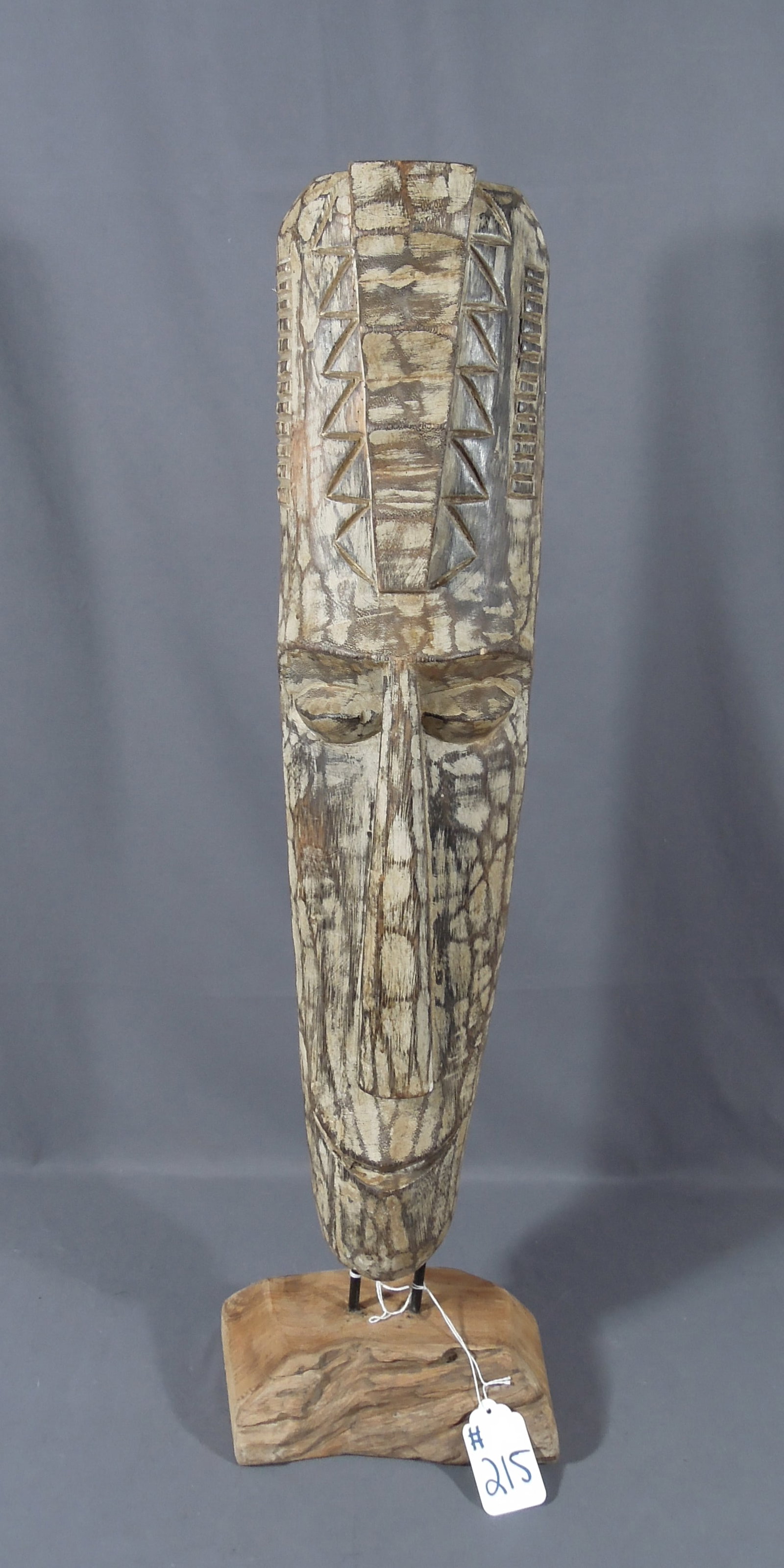 HAND CARVED WOODEN TOTUM STYLE BUST OF MAN: Drift wood base. 33 1/2" high, 9" wide, 7" deep.