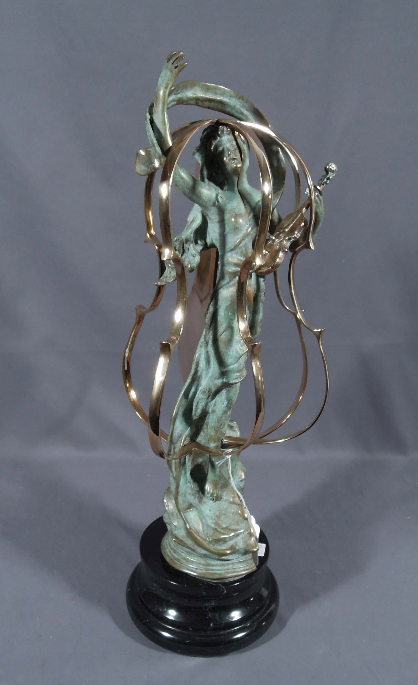ARMAN (ARMAND PIERRE FERNANDEZ) (1928-2005) FRENCH/AMERICAN: Limited Edition bronze sculpture "Ofelia (Foundation Arman 98)". Sliced bronze with green and gold patina. With incised signature and numbered PA 20/20. Circa 1996. 23 1/2" high, 10" wide, 9" deep.