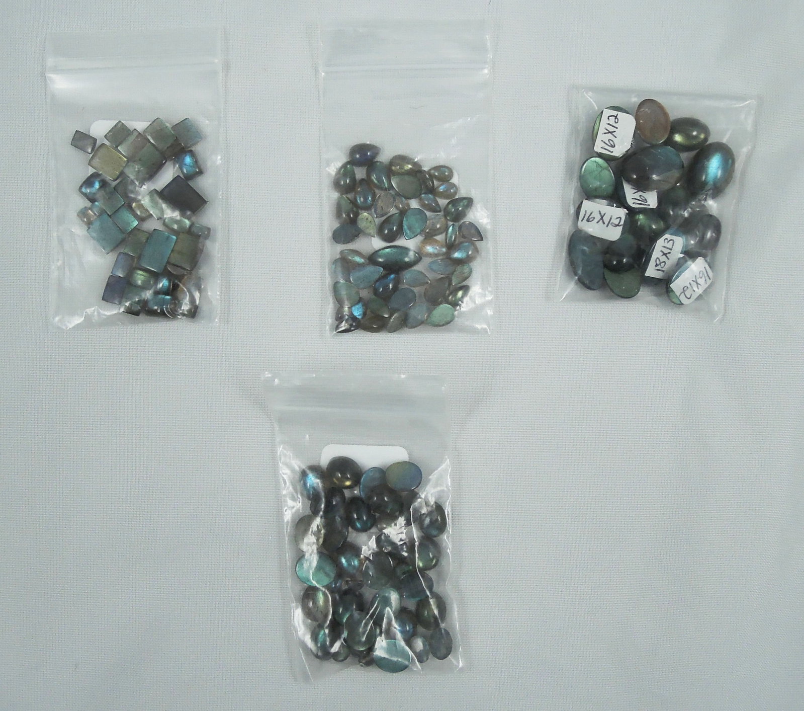 100's of cts. of fine labadorite.: All shapes and sizes.