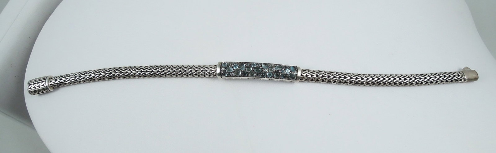 DESIGNER JOHN HARDY STERLING SILVER & BLUE TOPAZ PAVE STATION CLASSIC BRACELET: Signed with letter "M". 7 1/2" long.