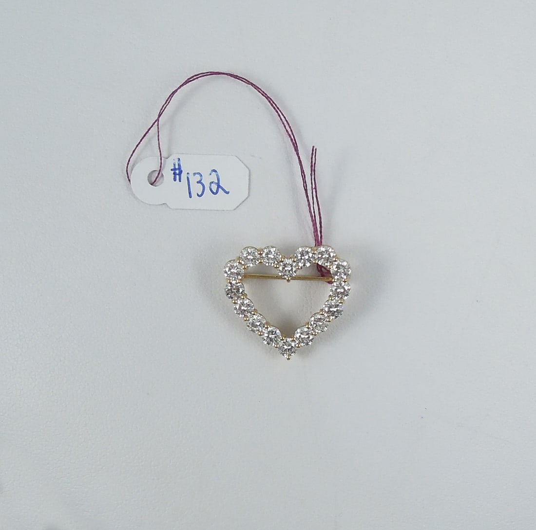 BEAUTIFUL VINTAGE TIFFANY & CO. 18K Y.G. & DIAMOND OPEN HEART BROOCH: Signed. Total diamond weight approx. 2 cts.
