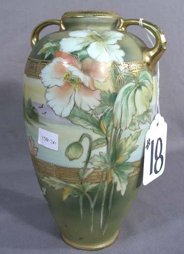 HAND PAINTED NIPPON DOUBLE HANDLED VASE: Floral motif. Mark on base. 10" high, 6" wide.