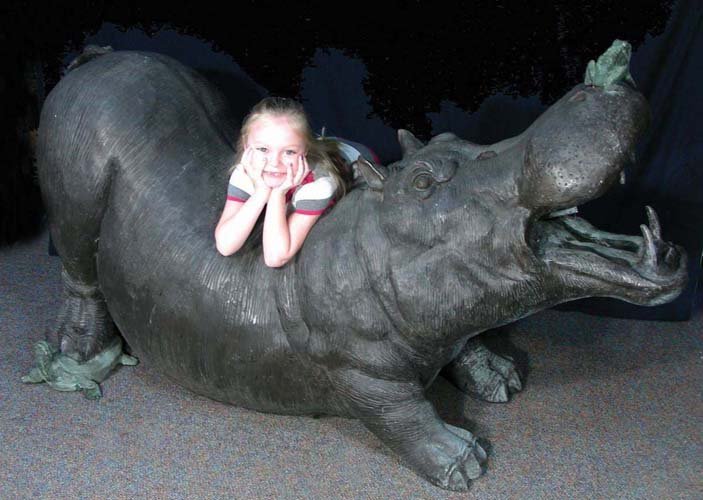 OUTSTANDING LIFE SIZE BRONZE SCULPTURE/FOUNTAIN OF: A large bronze hippo with open mouth. A frog sits on his nose and a turtle is under his foot. Fine detail. Brown and green patina. Note: Water emerges from hippo's mouth when used as a fountain. 41" h
