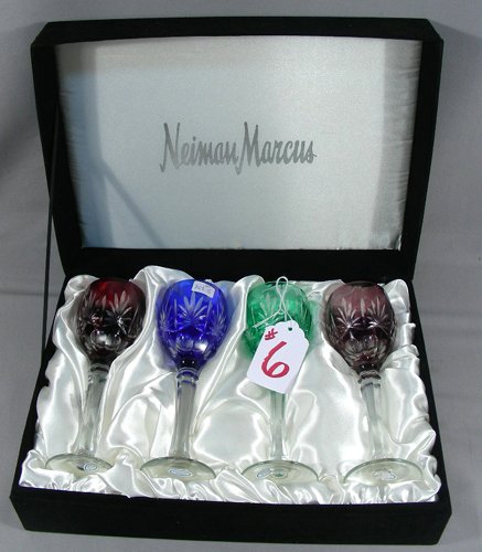 CASED SET OF FOUR CRYSTAL OVERLAY GLASSES: By Neiman Marcus.