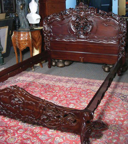 ELABORATELY HAND CARVED MAHOGANY QUEEN SIZE BED: Carved on headboard, footboard and side rails.