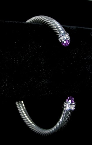 DESIGNER DAVID YURMAN STERLING SILVER, AMETHYST AND: A heavy cable bracelet with amethyst ends and two rows of full cut round diamonds. Signed.