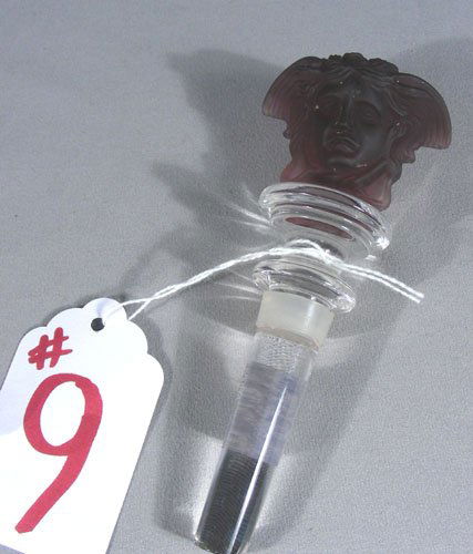 VERSACE CRYSTAL WINE STOPPER: By Rosenthal. Clear and purple coloration. 5" high.