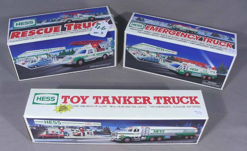 THREE VINTAGE HESS BATTERY OPERATED TOY TRUCKS (1 of 1)