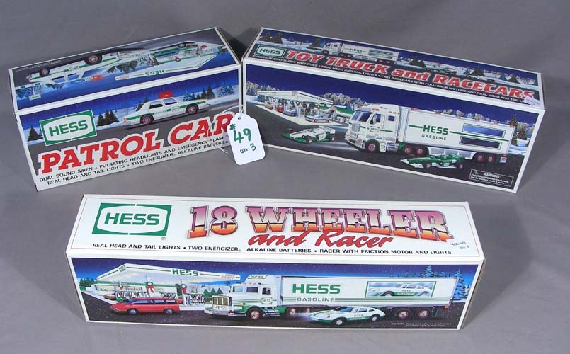THREE VINTAGE HESS BATTERY OPERATED TOY TRUCKS (1 of 1)