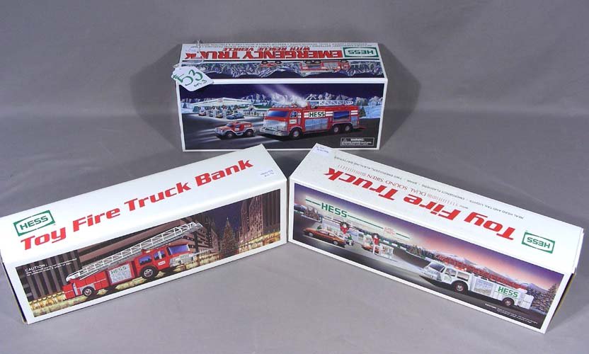 THREE VINTAGE HESS BATTERY OPERATED TOY TRUCKS (1 of 1)