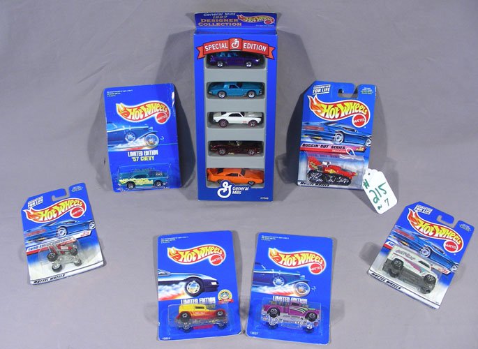 SEVEN HOT WHEELS SPECIAL EDITION DIE CAST CARS: 1:64 scale. Set includes: 6 individual cars in original packages and a Special Edition General Mills 1997 Designer Collection with 5 cars in original unopened box.