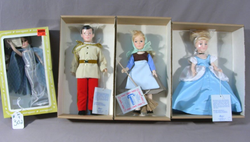 FOUR VINTAGE EFFANBEE DISNEY DOLLS: Includes: Poor Cinderella #3391, Cinderella #3390, Prince Charming #1590 and Little Mermaid #1160. Original boxes.