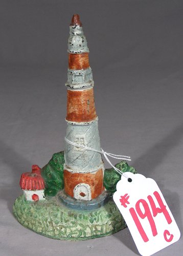 VINTAGE CAST IRON HAND PAINTED DOOR STOP "LIGHTHOUSE" (1 of 2)