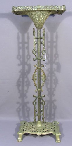 OLD OSCAR BACH STYLE HEAVY BRASS STAND: Ornate base and center with rectangular top with glass insert. 34 1/2" high, 12 1/2" wide, 9" deep.