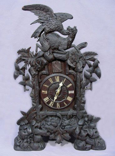 ANTIQUE BLACK FOREST CARVED WOODEN MANTLE CLOCK (1 of 2)