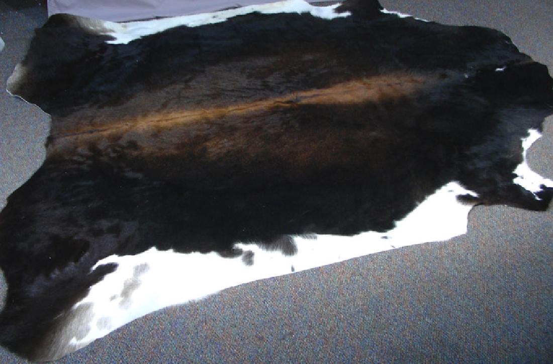 GENUINE COW HIDE AND LEATHER AREA RUG (1 of 1)