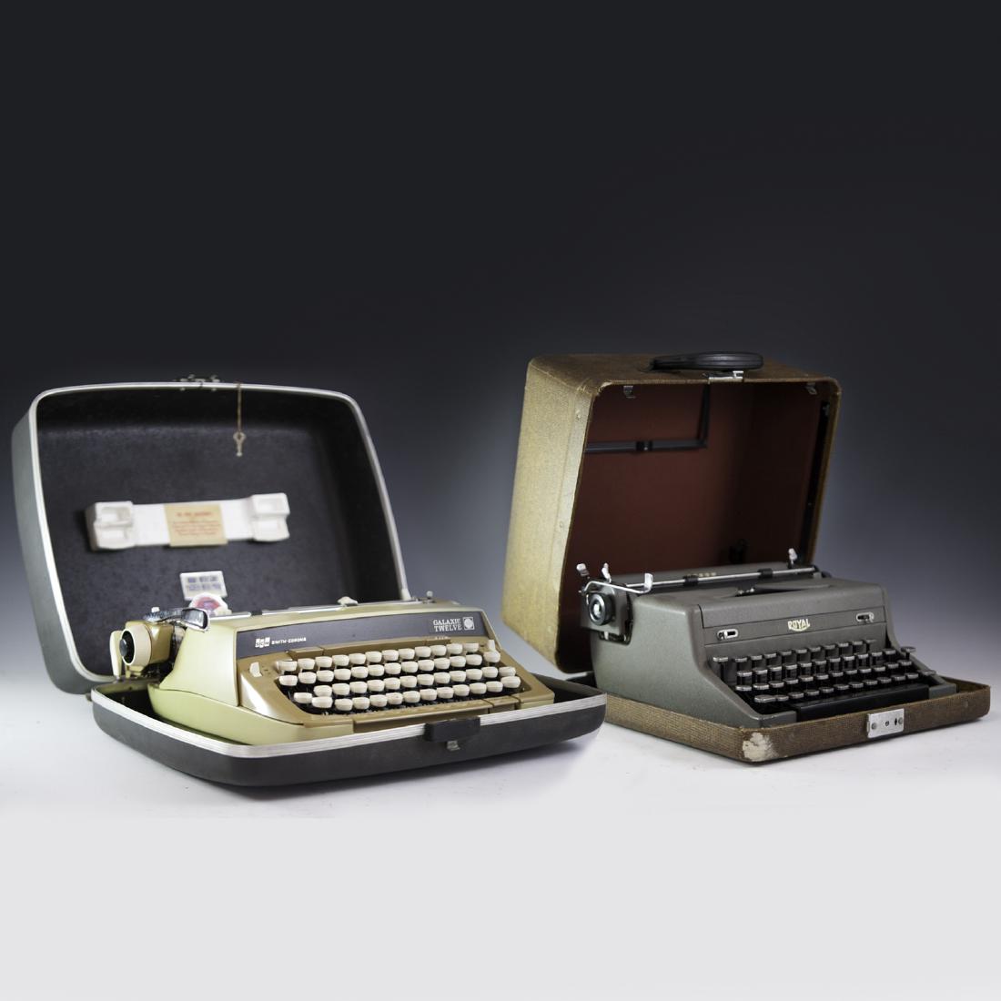 Vintage Typewriters: DESCRIPTION: A set of two vintage typewriters. The first is a Smith-Corona Galaxie Twelve XII model with a Jeweled Escapement. Includes original travel case. The second is a Royal Arrow typewriter tha