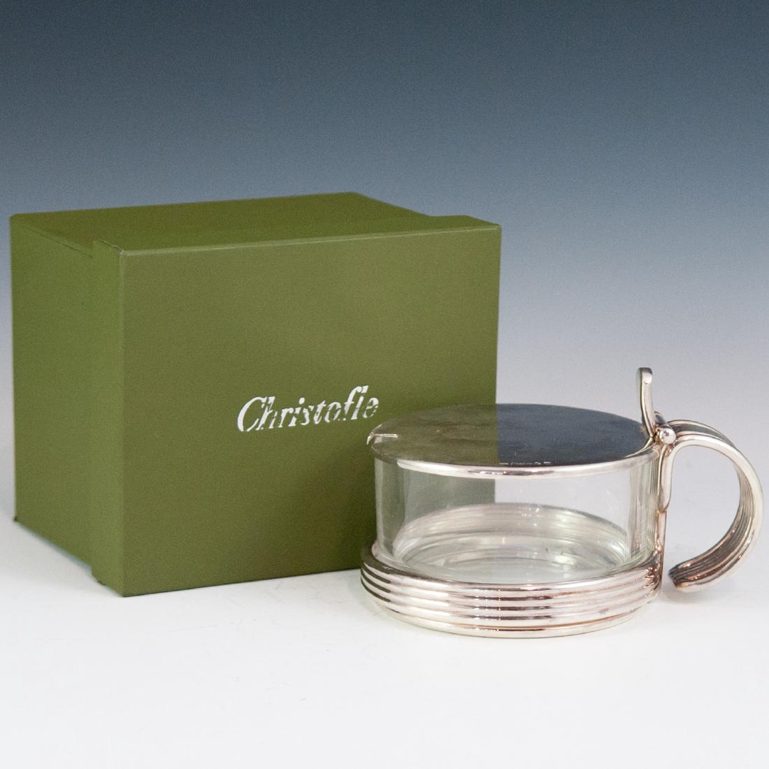 Christofle "Vibrations" Silver Plated Konfiture Jar: DESCRIPTION: A Christofle silverplated "Vibrations" patterned Konfiture Jar. Includes original packaging and a crystal insert. Spoon is missing. CIRCA: 21st Ct. ORIGIN: France DIMENSIONS: H:2 1/8" Dia