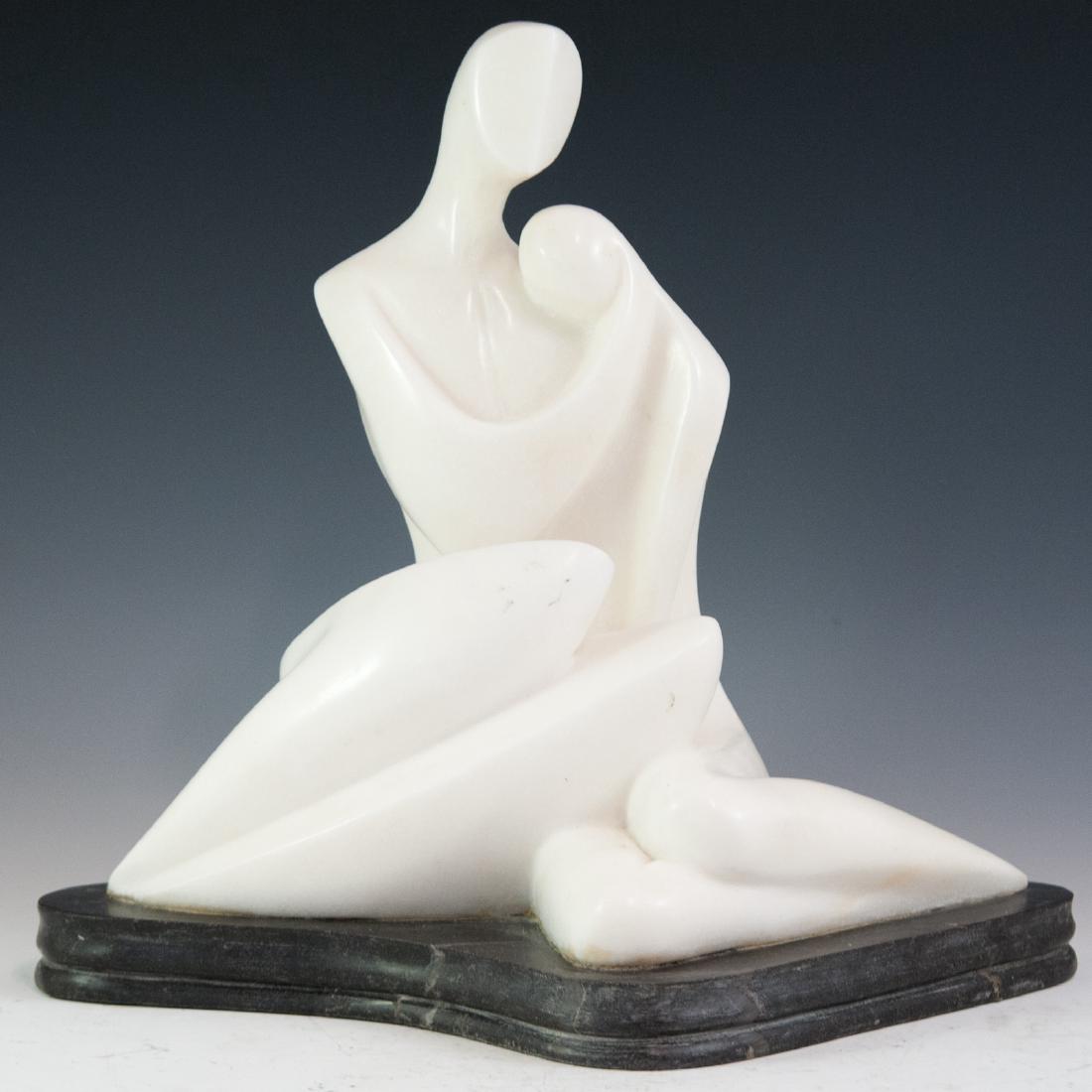 Attributed to Robert Russin (American 1914-2007): DESCRIPTION: A white marble sculpture attributed to rObert Russin. Features a lying man and woman embracing one another in an abstract, contemporary fashions. Rests atop a marble base. Unsigned. CIRCA