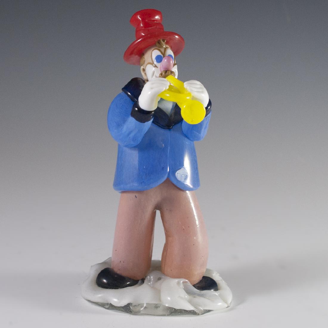 Bohemian Glass Clown Figurine: DESCRIPTION: A Bohemian glass figurine of a clown playing a trumpet. Vibrantly hued with swirled interior accents. Stickered on the bottom:"Bohemian Czechoslovakia" CIRCA: 20th Ct. ORIGIN: Czech Repub