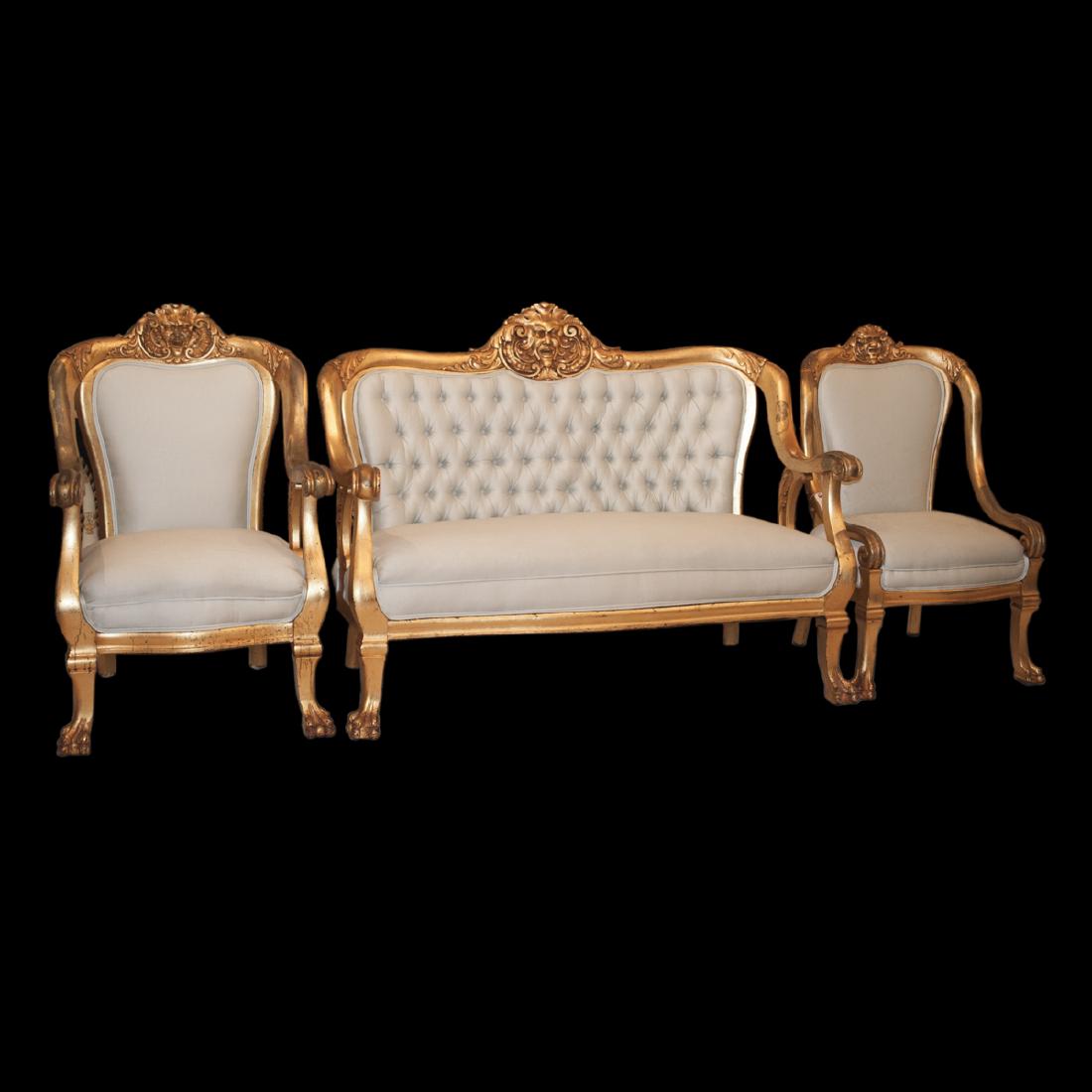 Victorian Furniture Set: DESCRIPTION:Victorian furniture set featuring a chair, an arm chair, and love set. All pieces are garnished with gilded wood frame and celeste blue upholstery. Finished with smiling figures along the