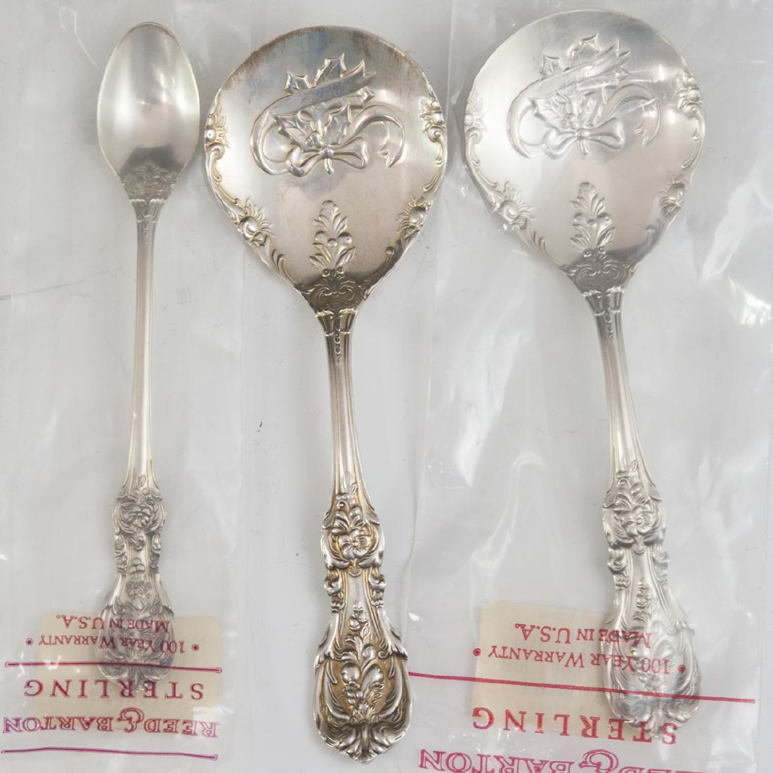 Reed & Barton Sterling "Francis I" Spoons: DESCRIPTION: A collection of three Reed & Barton sterling "Francis I" patterned spoons. Features repousse fruits enveloped by a scrolled rococo floral motif cartouche. Marked with Reed & Barton hallma