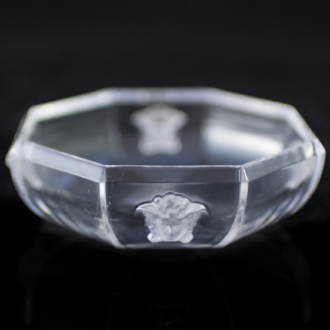 Rosenthal Versace Crystal "Lumiere" Bowl: DESCRIPTION: A Rosenthal Versace crystal Lumiere bowl. Features a rounded and beveled octagon form, garnished with frosted crystal Medusa heads. Marked:"Rosenthal Versace". CIRCA: Late 20th-Early 21st