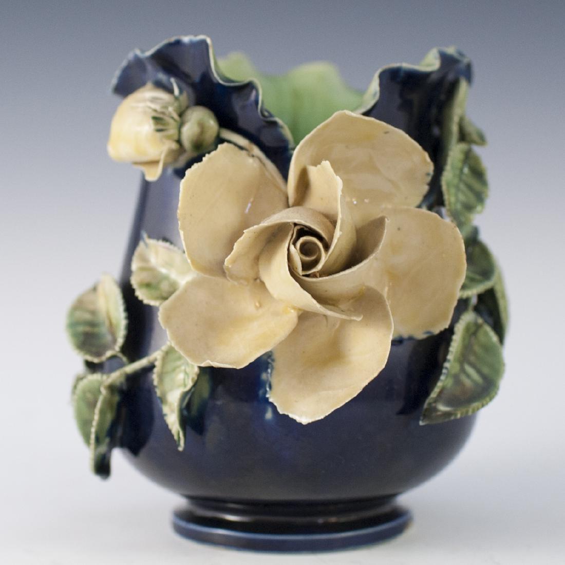 Antique French Longchamp Majolica Style Vase: DESCRIPTION: An antique French Longchamp majolica style vase. Not marked Longchamp but rather, is made in a Longchamp style. Features a rich cobalt base hue garnished with a detailed applied flower an