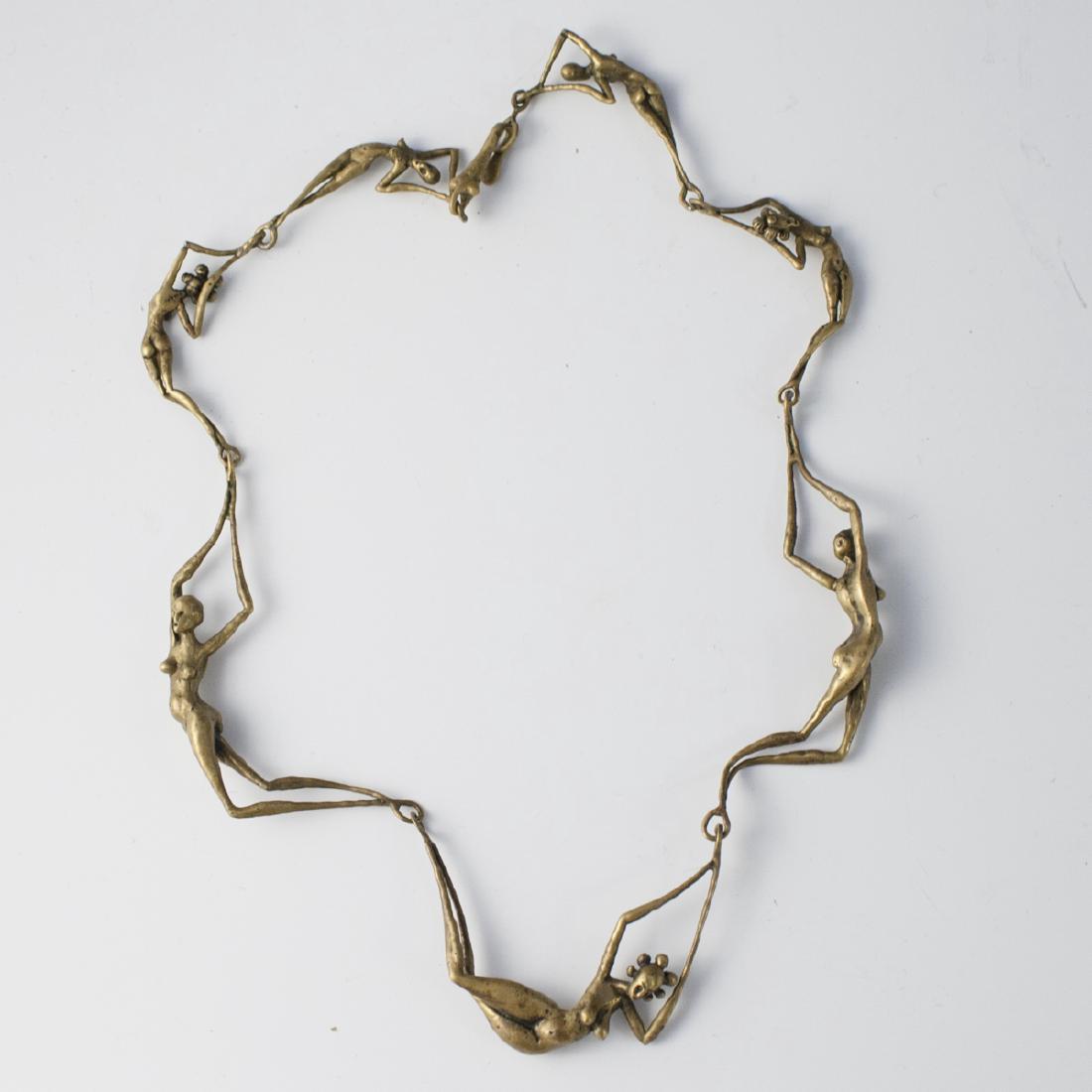 Antique Figural Bronze Necklace: DESCRIPTION: An antique figural bronze necklace. Features bronze links of abstract nude women. Finished with a hook clasp, not marked. CIRCA: Early-Mid 20th Ct. DIMENSIONS: (Open Length) 18.25" CONDIT