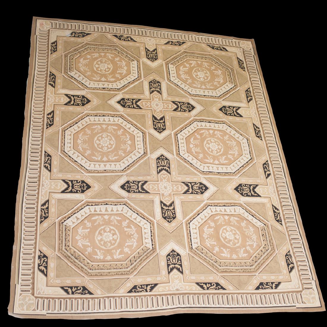 Italian Venitian Style Wool Rug: DESCRIPTION: An Italian Venetian style wool rug. Features a beige base hue, embellished with scrolled rococo floral motifs. CIRCA: Mid-Late 20th Ct. DIMENSIONS: 95"X122" CONDITION: Good condition. See
