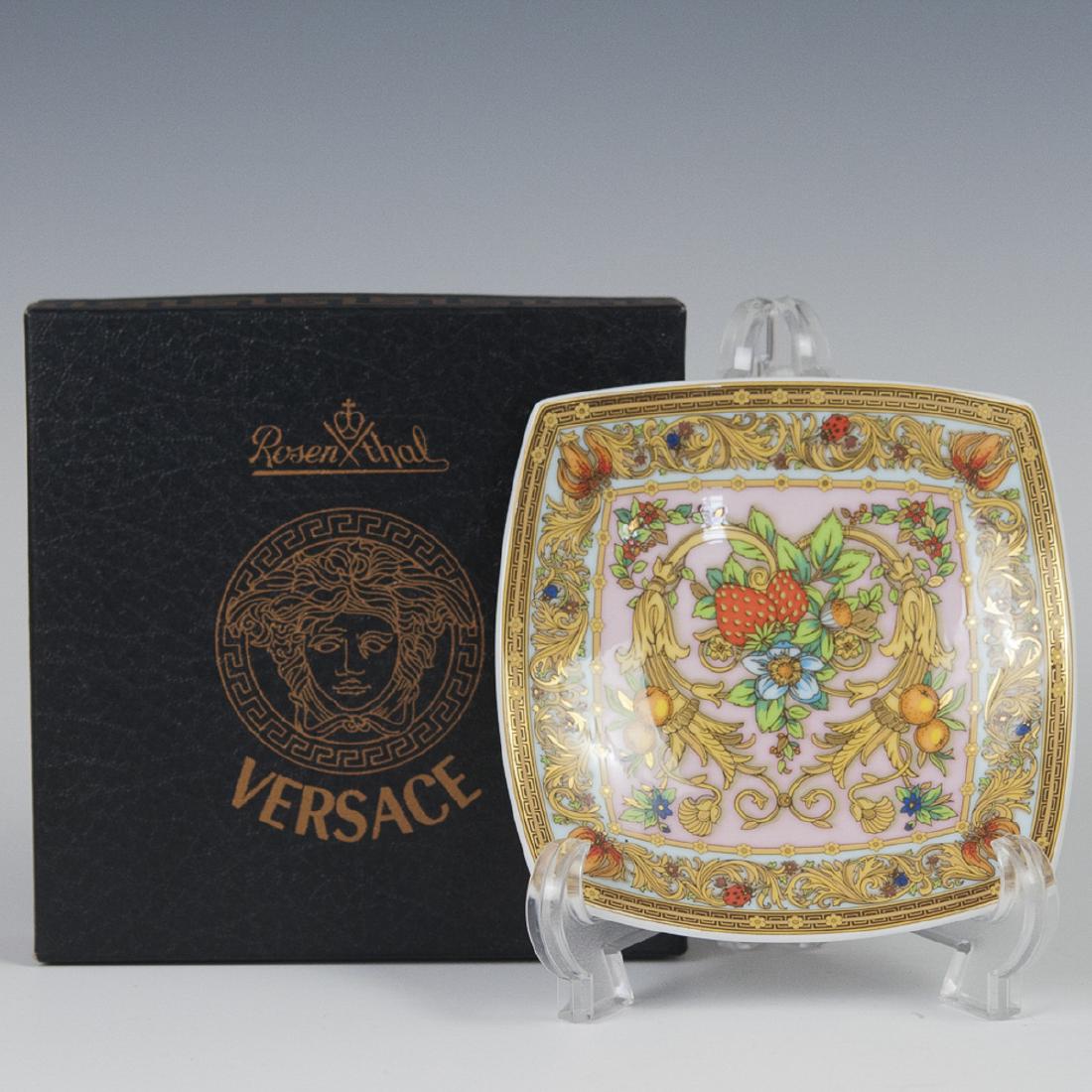 Rosenthal Versace "Le Jardin De Versace" Vide Poche: DESCRIPTION: A Rosenthal Versace "Le Jardin De Versace" patterned, vide poche porcelain tray. Features a squared form with convex edges and a scalloped center. Embellished with scrolled rococo floral