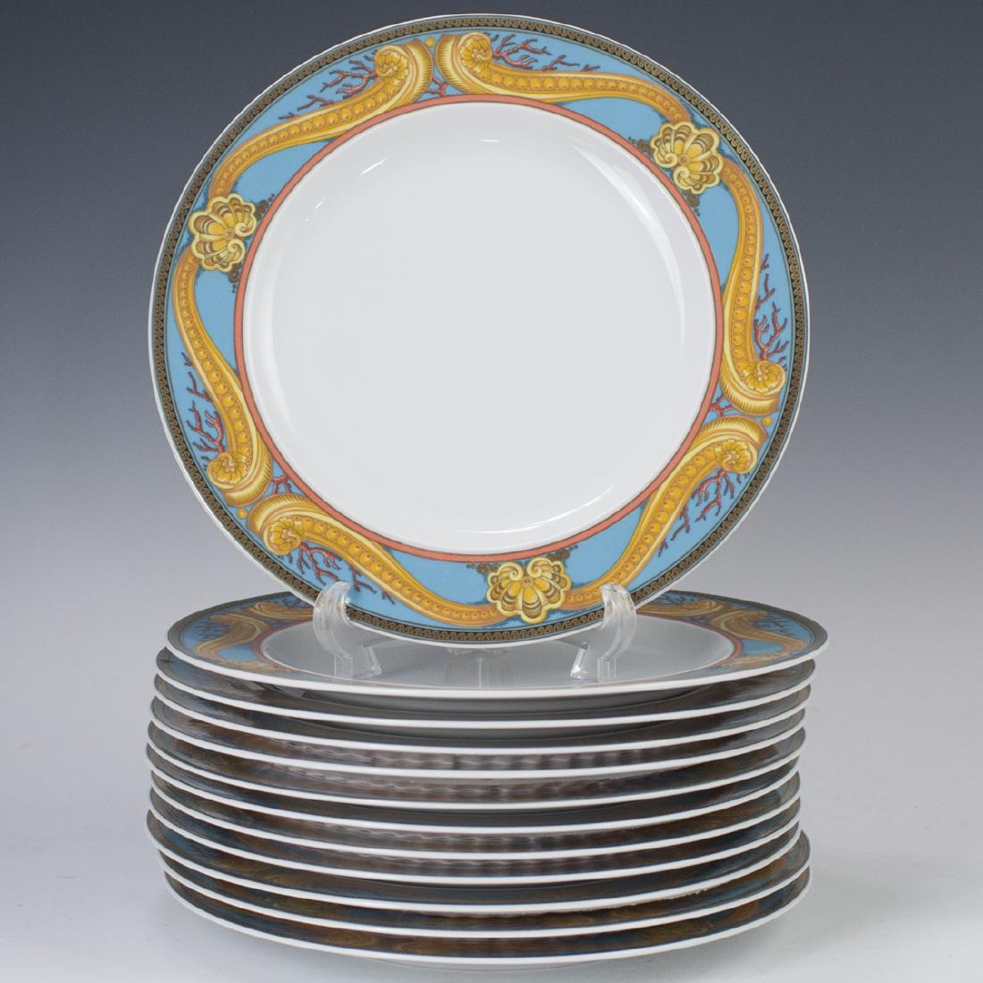 Rosenthal Versace "Les Tresors De La Mer" Porcelain: DESCRIPTION: A set of 12 Rosenthal Versace "Les Tresors De La Mer" patterned porcelain plates. Embellished with a rich turquoise base huem garnished with nautical motifs of scrolled rococo clam shells