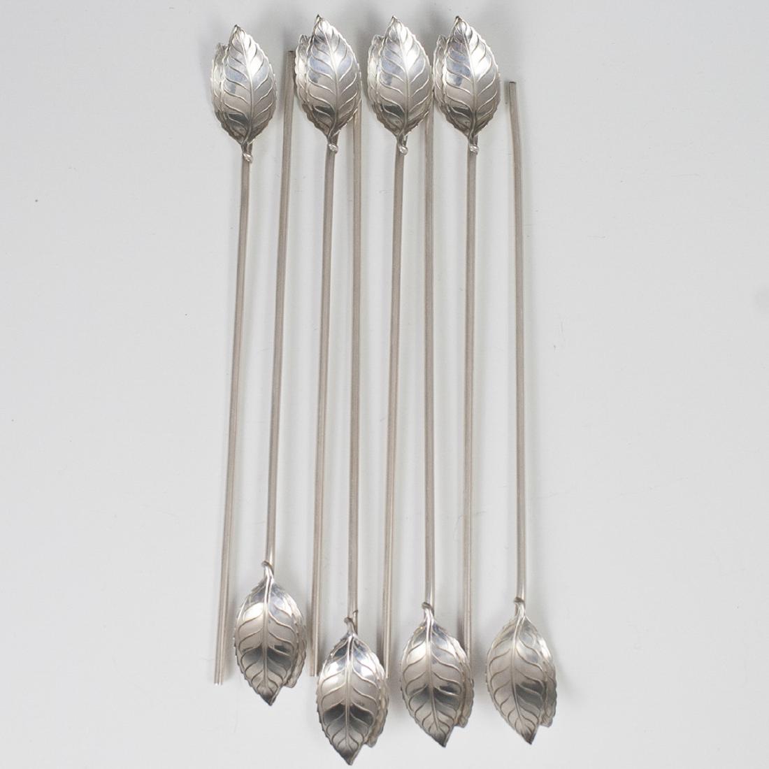 Tiffany & Co. Sterling Julep Ice Tea Stirrers: DESCRIPTION: A set of 8 Tiffany & Co. sterling julep, ice tea stirrers with engraved, leaf motif bowls along the tips. Hallmaked:"Tiffany & Co Sterling". CIRCA: Mid-Late 20th Ct. ORIGIN: USA DIMENSION