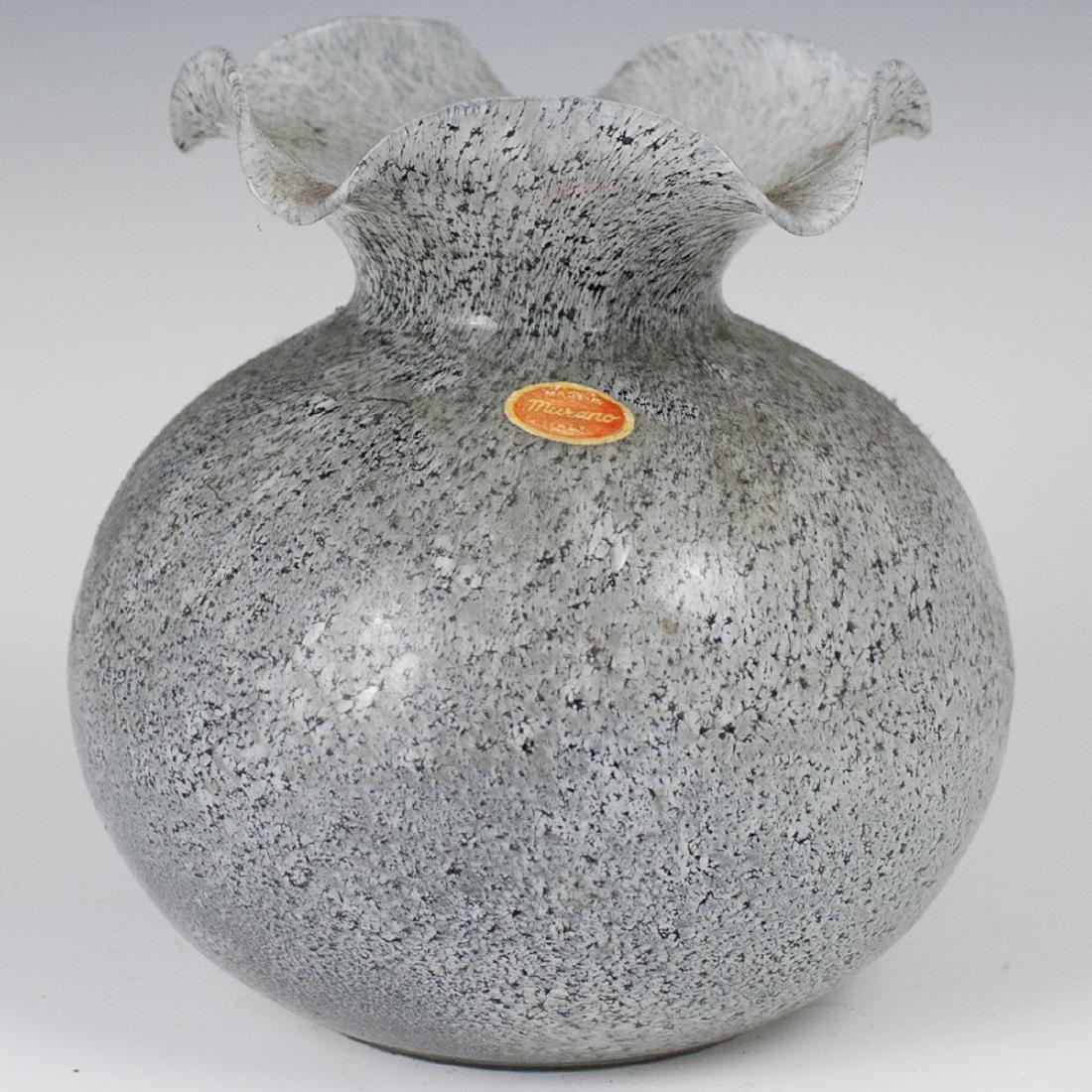 Vintage Murano Glass Vase: DESCRIPTION: A vintage Murano glass vase. Features a globular body with a tapering neck and a folded rim. Finished with spotted detailing. Stickered:"Made in Murano Italy". CIRCA: Mid-Late 20th Ct. OR