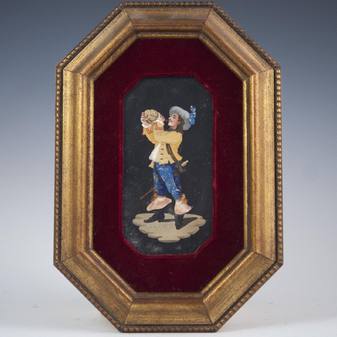 Vintage Italian Pietra Dura: DESCRIPTION: A vintage Italian framed pietra dura. Features a black slate foundation, inlaid with semi-precious stone, depicting a Renaissance era Italian man, drinking from a wine jug. Set in a gilt 