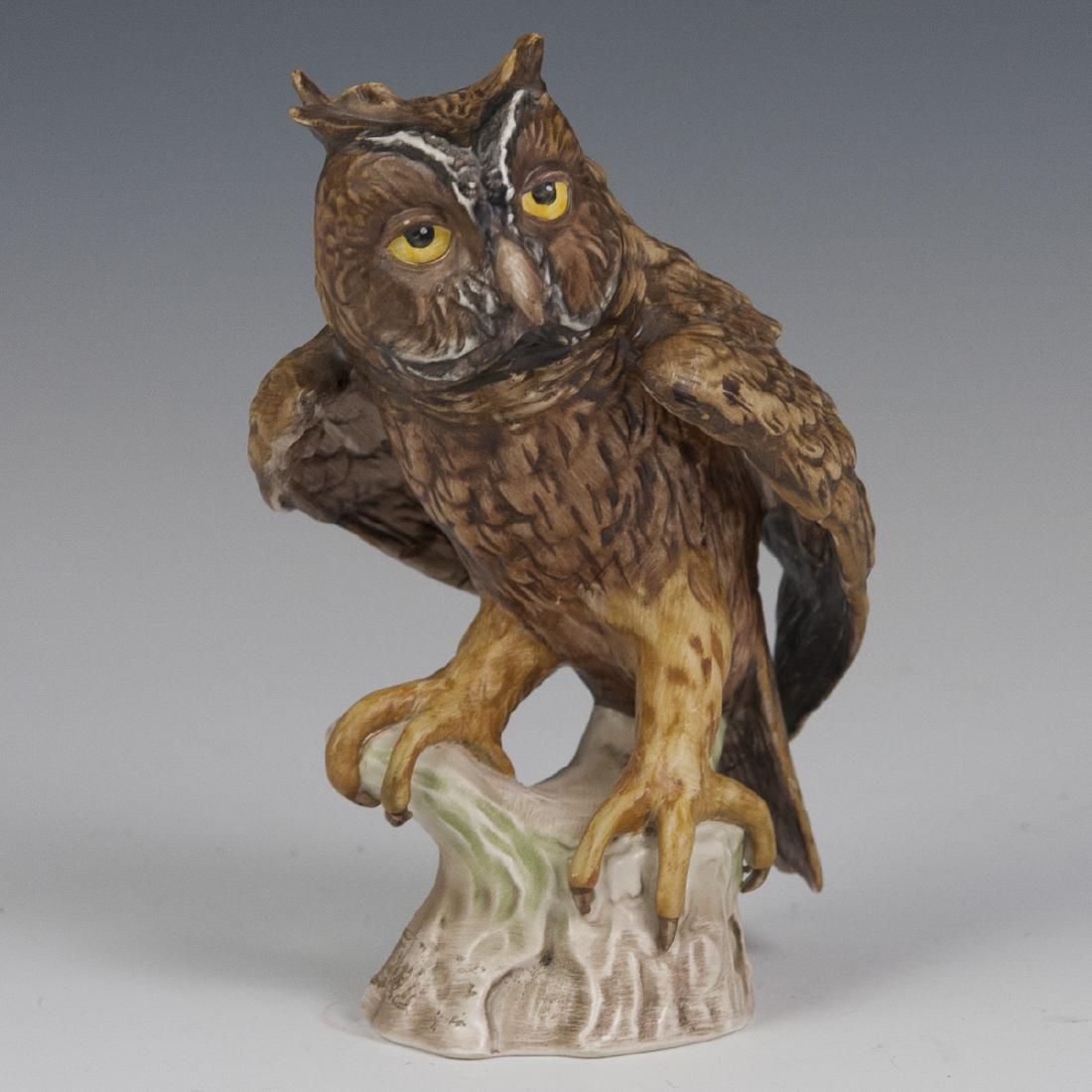 Vintage Goebel Porcelain Owl: DESCRIPTION: A vintage Goebel porcelain figurine of an owl perched top a tree branch. Marked along the underside:"Goebel W. Germany CV99 1969". CIRCA: 1969 ORIGIN: Germany DIMENSIONS: H:6 7/8" L:4" W: