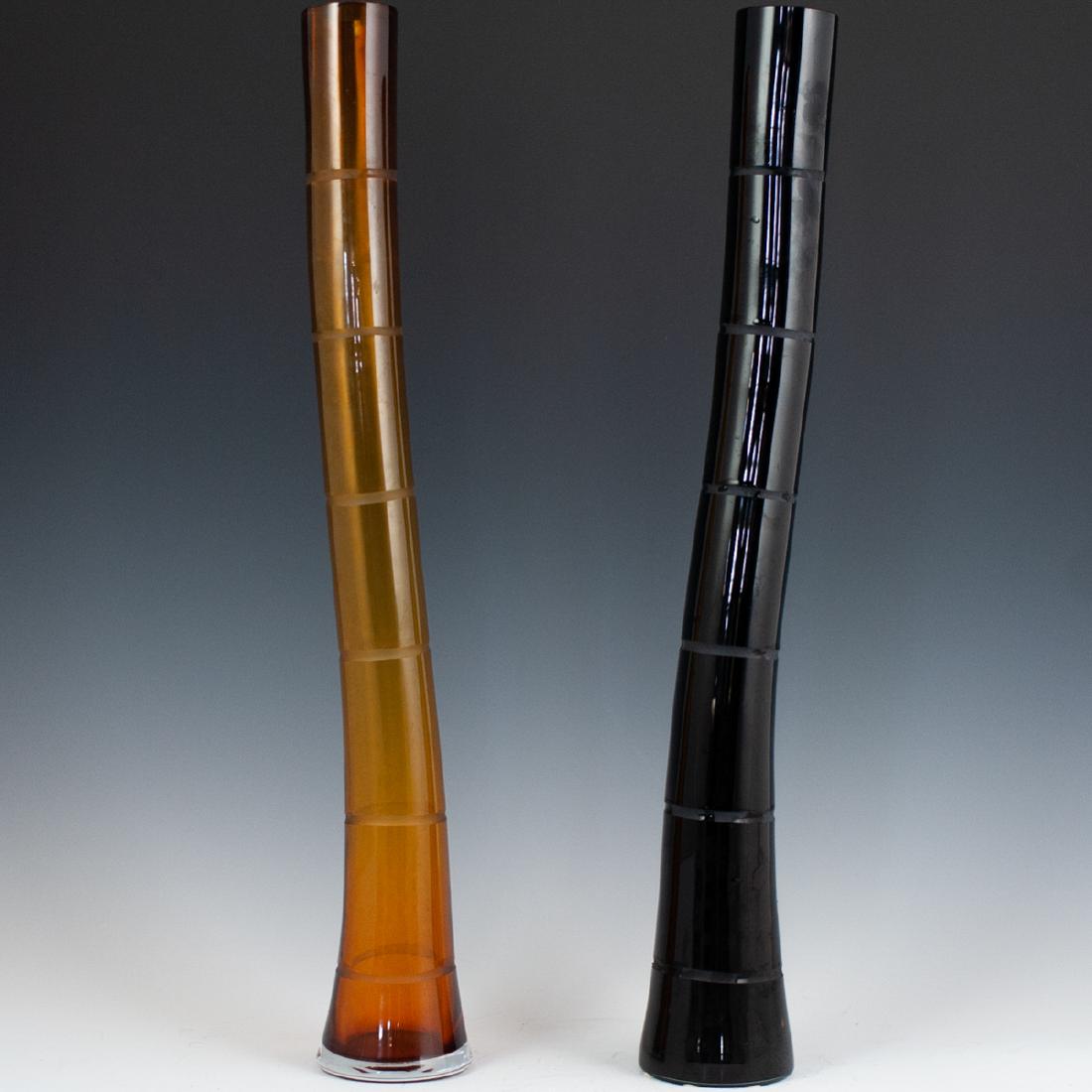 Salviati Art Glass Vases: DESCRIPTION: A pair of Salviati Murano glass vases. Composed of one amber toned, and one black toned vase, both in the motif of bamboo. The amber vase is signed:"Salviati 2002" the other is dated: 200
