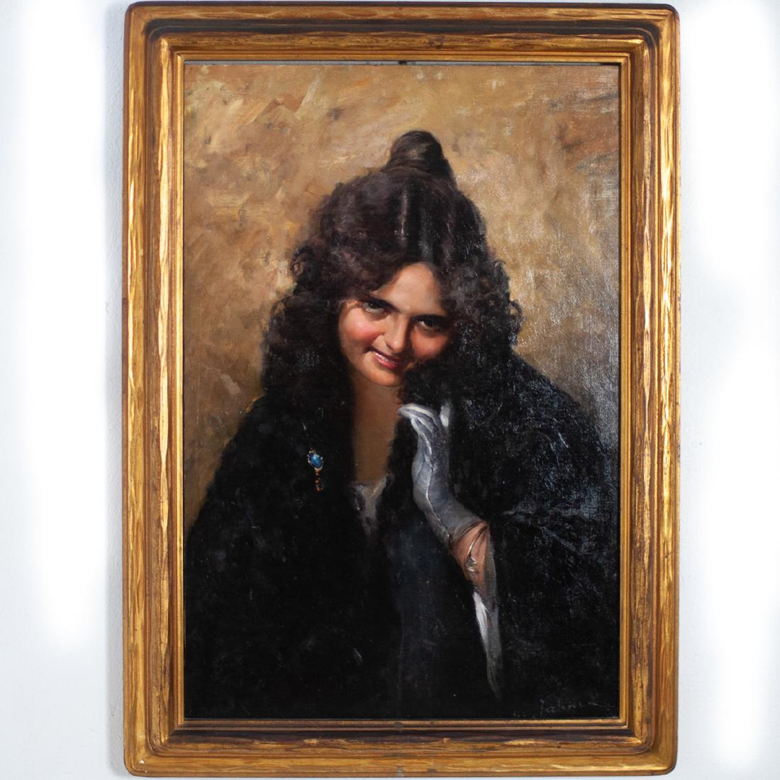 Ignacio Zuloaga Y Zabaleta (Spanish 1870 - 1945): DESCRIPTION: An oil on canvas by Ignacio Zuloaga Y Zabaleta. Features a portrait of a smiling woman wearing a fur coat. Signed along the bottom right corner and set in a gilt wooden frame. CIRCA: Earl