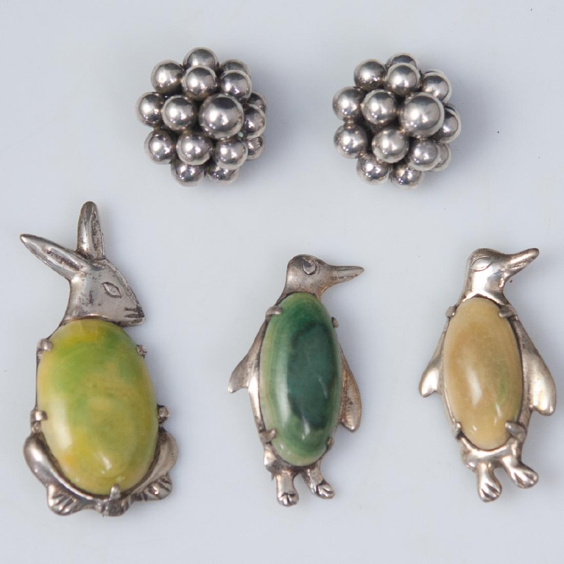Mexican Silver Jewelry: DESCRIPTION: A Mexican silver jewlery set composed of two penguin, and one rabbit motif, brooches with large center stones. Marked:"Silver Mexico. also includes a pair of Mexican sterling, beaded earr