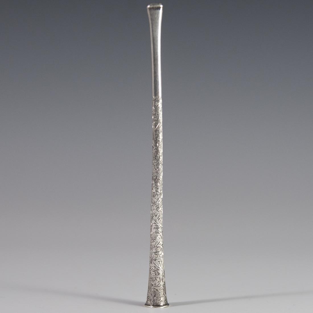 Antique Sterling Cigarette Tip: DESCRIPTION: An antique sterling cigarette tip. Features a fluted design with engraved rococo floral motif. Marked:"Sterling 950". CIRCA: 20th Ct. DIMENSIONS:L:6" Total Weight:16.7 grams CONDITION: Gr