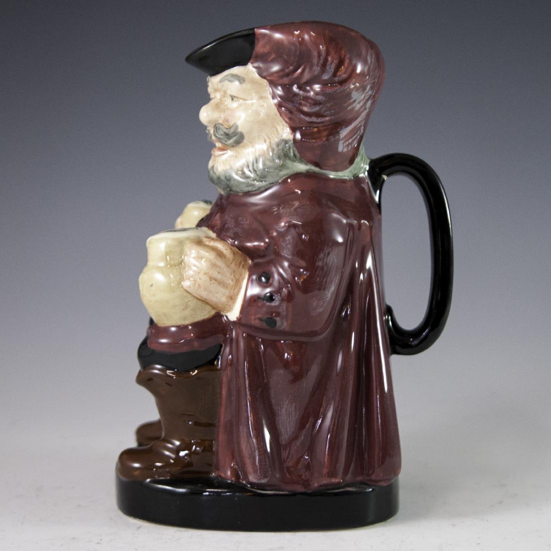 Royal Doulton "Falstaff" Porcelain Jug: DESCRIPTION: A Royal Doulton porcelain "Falstaff" jug. Features Shakespeare's character, Falstaff wielding to cups of ale as he sits in a chair. Handpainted and finished in an overall glossed glaze. M