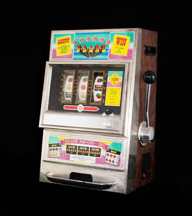 Vintage Casino Grand Slot Machine: DESCRIPTION: Vintage Waco casino grand slot machine decorated with gloss colors throughout the front. Coin operated with an extended slot arm on the right side. In working condition. CIRCA: 20th Ct. O