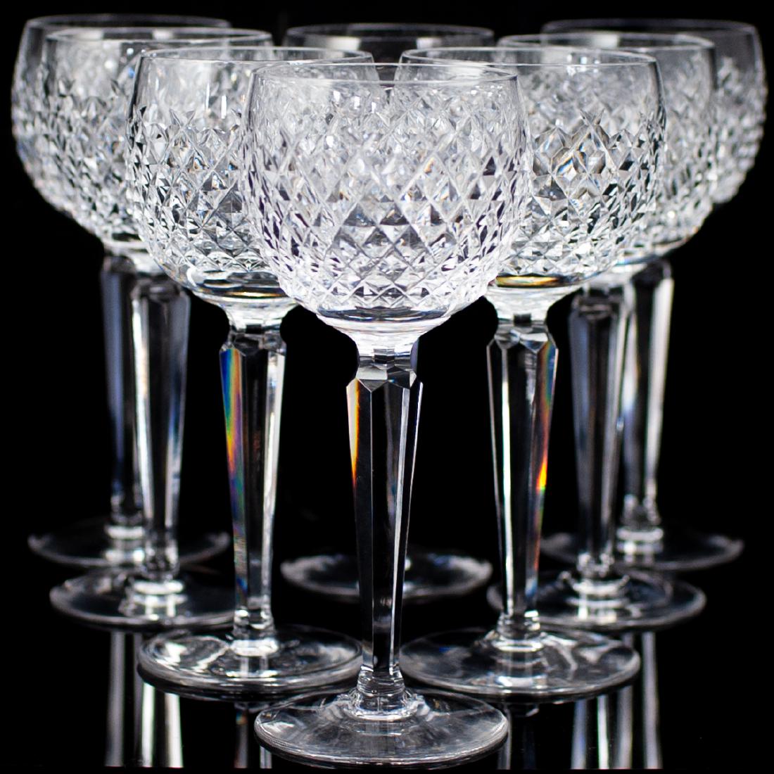 Set Of Waterford "Alana" Wine Glasses: DESCRIPTION: Set of 10 crystal wine glasses, embellished with "Alana" crystal cut pattern. Each cup marked underneath "Waterford" CIRCA: 20th Century ORIGIN: Ireland DIMENSIONS: H: 7.5" Diameter: 3.25