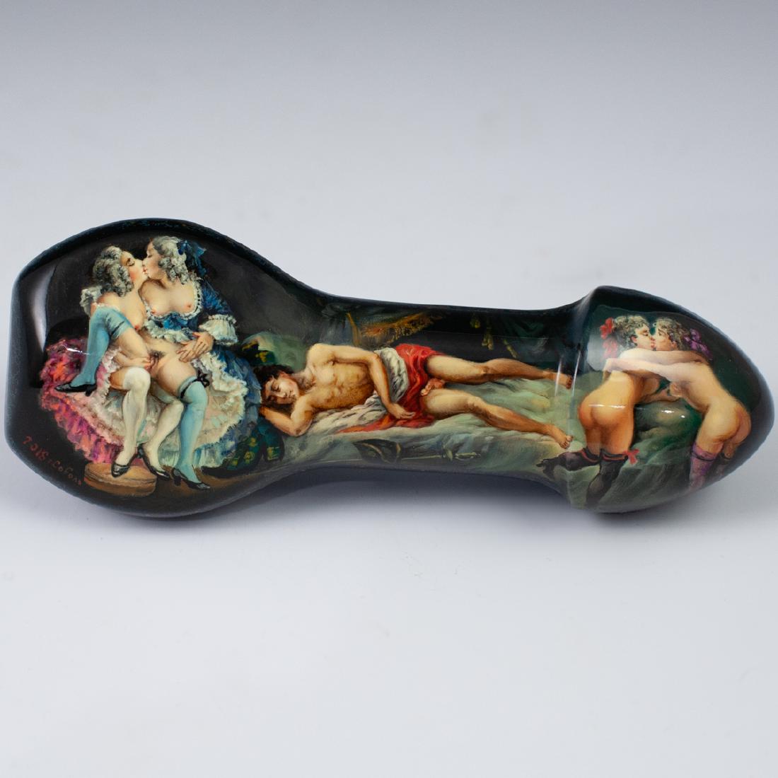 Russian Erotic Lacquered Phallic Box: DESCRIPTION: Russian lacquered papier mache boxes. The box features a dark blue base hue in an overall phallic shape, decorated with multiple hand painted Edwardian erotic scenes on the lid. Opens rev